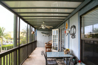 Condo screened porch B.jpg (79425 bytes)